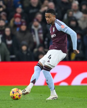 Ezri Konsa of Aston Villa passes the ball during the Premier League match Aston Villa vs Leicester City at Villa Park, Birmingham, United Kingdom, 4th January 2025 clipart