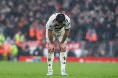 Manuel Ugarte of Manchester United after the final whistle during the Premier League match Liverpool vs Manchester United at Anfield, Liverpool, United Kingdom, 5th January 2024 clipart