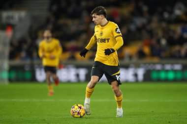 Rodrigo Gomes of Wolverhampton Wanderers makes a break with the ball during the Premier League match Wolverhampton Wanderers vs Nottingham Forest at Molineux, Wolverhampton, United Kingdom, 6th January 2025 clipart