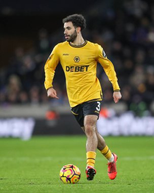 Wolverhampton Wanderers takımından Rayan At-Nouri, Premier League maçı sırasında topu Molineux, Wolverhampton, Birleşik Krallık 'ta Wolverhampton, 6 Ocak 2025' te Nottingham Ormanı 'na karşı fırlattı.