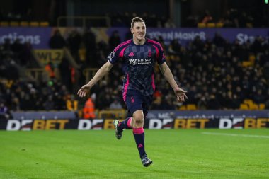 Nottingham Ormanı 'ndan Chris Wood, Premier League maçında Wolverhampton Wanderers, Nottingham Ormanı' na karşı 6 Ocak 2024 tarihinde oynanan Molineux, Wolverhampton, Birleşik Krallık maçında 0-2 'lik galibiyet golünü kutluyor.