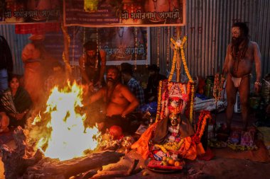 A Naga saint ritual before is giving his blessings to pilgrims at a transit camp of the Gangasagar fair in Kolkata, India, on January 7, 2025. The Gangasagar Mela is an annual Hindu festival held at Gangasagar, West Bengal, where the Ganges River clipart