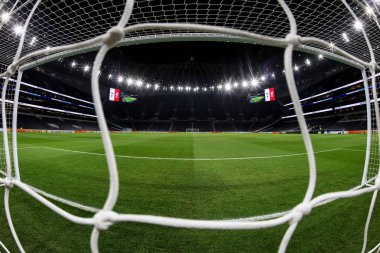 A general view of The Tottenham Hotspur Stadium from the goalmouth uring the Carabao Cup Semi-Finals First Leg Tottenham Hotspur vs Liverpool at Tottenham Hotspur Stadium, London, United Kingdom, 8th January 2025 clipart