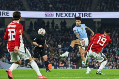 Manchester City 'den Nico O' Reilly, 11 Ocak 2025 tarihinde İngiltere 'nin Etihad Stadyumu' nda oynanan 3.