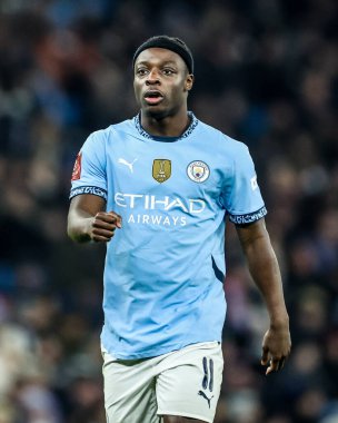 Manchester City 'den Jrmy Doku, 11 Ocak 2025 tarihinde İngiltere' nin Etihad Stadyumu 'nda oynanan 3.