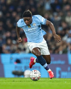 Manchester City 'den Jrmy Doku, 11 Ocak 2025 tarihinde İngiltere' nin Etihad Stadyumu 'nda oynanan 3.