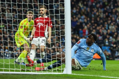 Manchester City 'den Divin Mübama, 11 Ocak 2025 tarihinde İngiltere' nin Etihad Stadyumu 'nda oynanan 3.