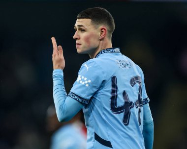 Manchester City 'den Phil Foden, 11 Ocak 2025 tarihinde Etihad Stadyumu' nda oynanan Manchester City-Salford maçında oynanan 3.