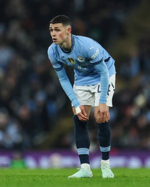 Manchester City 'den Phil Foden, 11 Ocak 2025 tarihinde Etihad Stadyumu' nda oynanan ve Manchester City 'nin Salford City' ye karşı oynadığı 3.