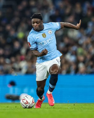 Manchester City 'den Jrmy Doku, 11 Ocak 2025 tarihinde İngiltere' nin Etihad Stadyumu 'nda oynanan 3.