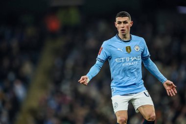 Manchester City 'den Phil Foden, 11 Ocak 2025 tarihinde Etihad Stadyumu' nda oynanan Manchester City-Salford maçında oynanan 3.