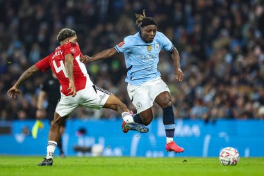 Manchester City 'den Jrmy Doku, 11 Ocak 2025 tarihinde Etihad Stadyumu' nda oynanan ve Manchester City 'nin Salford City' ye karşı oynadığı 3.