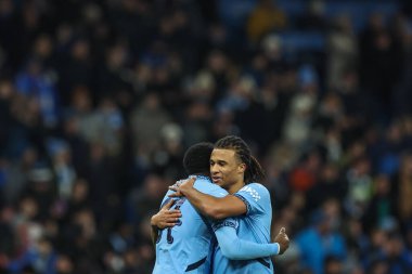 Manchester City 'den Divin Mübama, 11 Ocak 2025 tarihinde Etihad Stadyumu' nda oynanan ve Manchester City ile Salford City arasında oynanan 3.