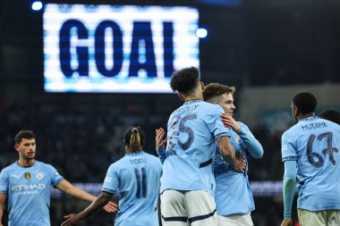 Manchester City 'den Nico O' Reilly, 11 Ocak 2025 tarihinde Etihad Stadyumu 'nda oynanan ve Manchester City ile Salford City arasında oynanan 3.