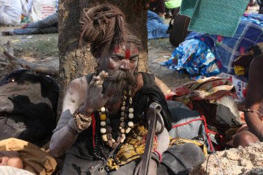 A holy Man at a Gangasagar mela transit camp in Kolkata, India, on January 11, 2025  clipart