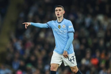 Manchester City 'den Phil Foden, 11 Ocak 2025 tarihinde İngiltere' nin Etihad Stadyumu 'nda oynanan 3.