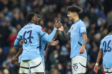 Manchester City 'den Divin Mübama, 11 Ocak 2025 tarihinde Etihad Stadyumu' nda oynanan ve Manchester City ile Salford City arasında oynanan 3.