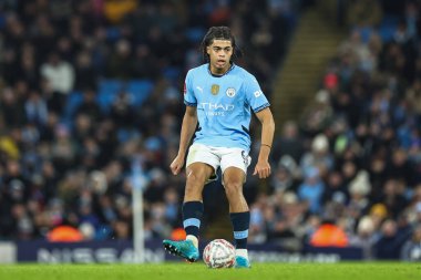 Manchester City 'den Jahmai Simpson-Pusey, Birleşik Krallık Etihad Stadyumu' nda oynanan 3. Raund Manchester City - Salford City karşılaşmasında 11 Ocak 2025