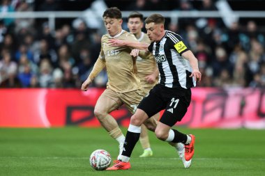 Newcastle United takımından Harvey Barnes, 12 Ocak 2025 'te İngiltere' nin Newcastle kentinde oynanan 3. Raund Newcastle United - Bromley FC karşılaşmasında topu ileri taşıyor.
