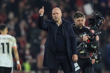 Arne Slot manager of Liverpool gives the traveling fans the thumbs up after a 1-1 draw during the Premier League match Nottingham Forest vs Liverpool at City Ground, Nottingham, United Kingdom, 14th January 2025 clipart