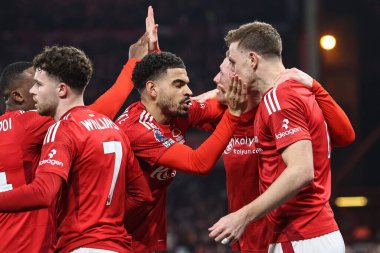 Nottingham Ormanı 'ndan Chris Wood, Premier Lig maçında Nottingham Forest' a karşı Liverpool 'da 14 Ocak 2025' te Nottingham, İngiltere 'de takım arkadaşlarıyla 1-0 yapma hedefini kutluyor.