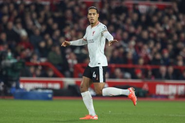 Virgil van Dijk of Liverpool gives his team instructions during the Premier League match Nottingham Forest vs Liverpool at City Ground, Nottingham, United Kingdom, 14th January 2025 clipart