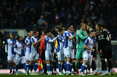 Both teams shake hands before the Sky Bet Championship match Blackburn Rovers vs Portsmouth at Ewood Park, Blackburn, United Kingdom, 15th January 2025 clipart