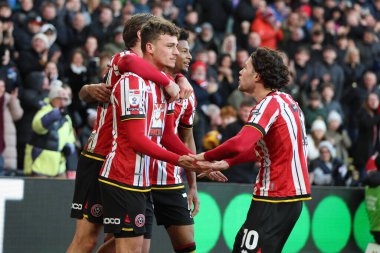 Sheffield United takımından Harrison Burrows, 18 Ocak 2025 'te Bramall Lane, Sheffield, İngiltere' de oynanan ve Sheffield United ile Norwich City arasındaki Sky Bet Şampiyonası maçında 1-0 yenilen golünü kutluyor.