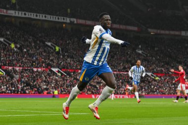 Brighton & Hove Albion takımından Yankuba Minteh, Manchester United ve Hove Albion 'ın 19 Ocak 2025' te Old Trafford, Manchester 'da oynadığı Premier League maçında 0-1 kazanma golünü kutluyor.