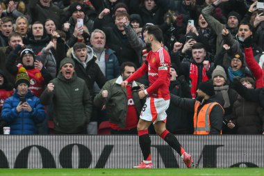 Manchester United takımından Bruno Fernandes, 19 Ocak 2025 'te Old Trafford, Manchester, İngiltere' de oynanan Premier League maçında Manchester United ve Hove Albion maçında skoru 1-1 yapma penaltısını kutluyor.