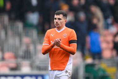 Albie Morgan of Blackpool applauds the fans at the end of the  Sky Bet League 1 match Blackpool vs Huddersfield Town at Bloomfield Road, Blackpool, United Kingdom, 18th January 2025 clipart