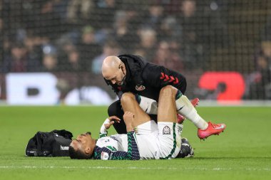 Sunderland 'dan Wilson Isidor, 17 Ocak 2025' te Burnley, Burnley, İngiltere 'deki Turf Moor' da oynanan Gökyüzü İddia Şampiyonası karşılaşmasında tedavi görüyor.