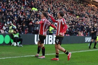 Sheffield United takımından Harrison Burrows, 18 Ocak 2025 'te Bramall Lane, Sheffield, İngiltere' de oynanan ve Sheffield United ile Norwich City arasındaki Sky Bet Şampiyonası maçında 1-0 yenilen golünü kutluyor.