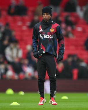 Manchester United 'dan Amad Diallo Premier Lig karşılaşması öncesinde Manchester United ile Brighton ve Hove Albion arasında oynanan maç öncesi ısınma maçında Old Trafford, Manchester, İngiltere' de 19 Ocak 2025