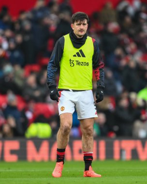 Harry Maguire of Manchester United during the pre-game warmup ahead of the Premier League match Manchester United vs Brighton and Hove Albion at Old Trafford, Manchester, United Kingdom, 19th January 2025 clipart