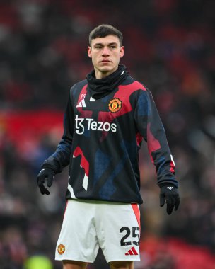 Manchester United 'dan Manuel Ugarte Premier Lig karşılaşması öncesinde Manchester United ve Hove Albion' a karşı Old Trafford, Manchester, İngiltere 'de 19 Ocak 2025' te oynanan maç öncesi ısınma maçında