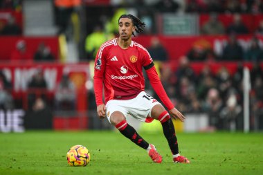 Leny Yoro of Manchester United makes a break with the ball during the Premier League match Manchester United vs Brighton and Hove Albion at Old Trafford, Manchester, United Kingdom, 19th January 2025 clipart