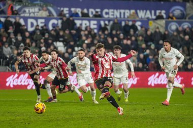 Sheffield United takımından Harrison Burrows, 21 Ocak 2025 'te Swansea.com Stadyumu' nda oynanan Swansea City-Sheffield United maçında 1-2 'lik skorla penaltı attı.