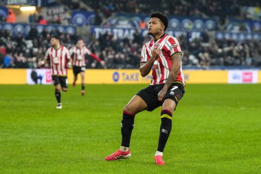 Sheffield United takımından Rhian Brewster, 21 Ocak 2025 'te İngiltere' nin Swansea.com Stadyumu 'nda oynanan Swansea City-Sheffield United maçında takımının ilk golünü atmasını kutluyor.