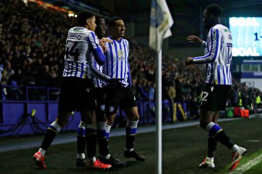 Sheffield Wednesday 'den Djeidi Gassama, 22 Ocak 2025' te İngiltere 'nin Sheffield kentinde Çarşamba günü Bristol City' ye karşı oynanan Gökyüzü İddia Şampiyonası maçında golünü kutluyor.