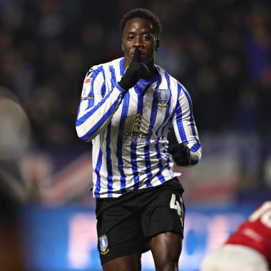 Sheffield Wednesday 'den Djeidi Gassama, 22 Ocak 2025' te İngiltere 'nin Sheffield kentinde Çarşamba günü Bristol City' ye karşı oynanan Gökyüzü İddia Şampiyonası maçında golünü kutluyor.