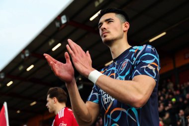 Blackpool 'dan Elkan Baggott, 25 Ocak 2025' te St James 'Park, Exeter' da oynanan Sky Bet 1 karşılaşmasında gezgin taraftarları alkışlıyor.