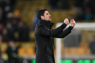 Arsenal 'in Mikel Arteta Müdürü, 25 Ocak 2025' te İngiltere 'de Molineux, Wolverhampton' da oynanan Premier League maçının sonunda Wolverhampton Wanderers-Arsenal maçının galibiyetini kutluyor.