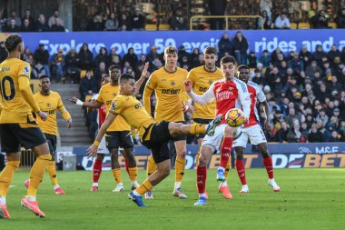 Wolverhampton Wanderers takımının Andr 'ı Premier League maçında Wolverhampton Wanderers' a karşı Molineux, Wolverhampton, Birleşik Krallık 'ta 25 Ocak 2025' te oynanan maçta topu bir haçtan temizledi.