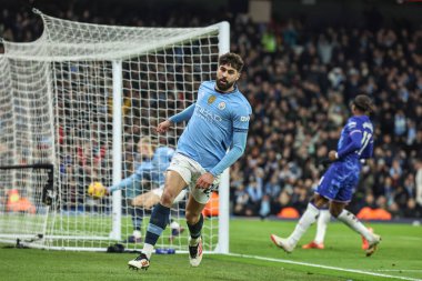 Manchester City 'den Joko Gvardiol, 25 Ocak 2025' te Etihad Stadyumu 'nda oynanan Premier League maçında 1-1' lik galibiyetini kutluyor.