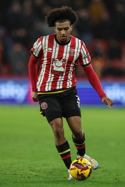 Sheffield United takımından Sam McCallum, 24 Ocak 2025 'te Sheffield United' ın Hull City 'ye karşı oynadığı maçta topla birlikte Bramall Lane, Sheffield, Birleşik Krallık' ta.