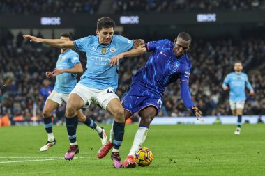 Chelsea 'li Nicolas Jackson, Manchester City - Chelsea maçında Manchester City maçı sırasında Manchester City' den Abdukodir Khusanov tarafından 25 Ocak 2025 'te Etihad Stadyumu' nda yenildi.