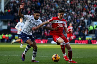 Finn Azaz of Middlesbrough dribbles past Kaine Kesler Hayden of Preston North End during the Sky Bet Championship match Preston North End vs Middlesbrough at Deepdale, Preston, United Kingdom, 25th January 2025 clipart