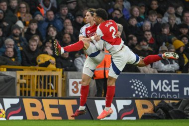 Arsenal 'den Riccardo Calafiori, 25 Ocak 2025' te Molineux, Wolverhampton, Birleşik Krallık 'ta oynanan Premier League maçında Wolverhampton Wanderers-Arsenal maçında 0-1 kazanma hedefini kutluyor.