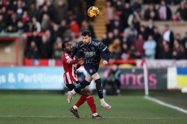 Blackpool 'dan James Husband, 25 Ocak 2025' te St James 'Park, Exeter, İngiltere' de oynanan Sky Bet 1 karşılaşmasında topa önderlik ediyor.